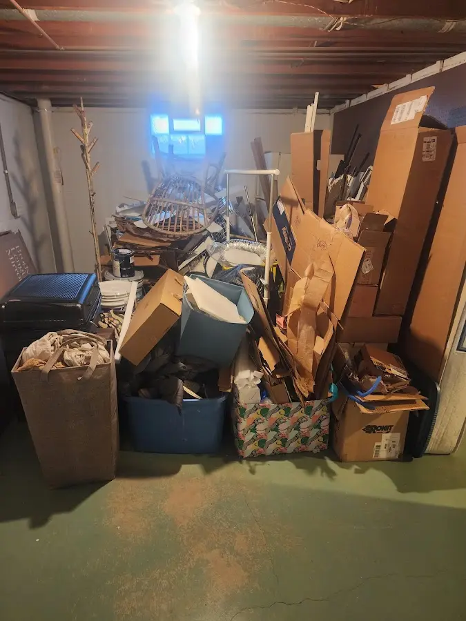 Roll-off dumpster container at job site for 4 Yard Dumpster Rental in Millcreek